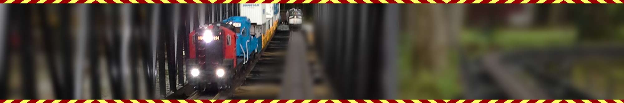 Close-up of a train moving on tracks inside a tunnel.